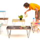 Illustration for article titled Giant Paperclips Turn Any Slab of Wood Into a Sturdy Table